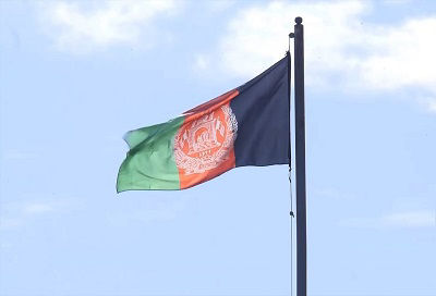 The flag of Afghanistan flying at the Presidential Palace compound in Kabul, Afghanistan in 2019