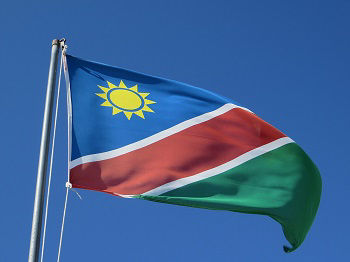 The flag of Namibia flies