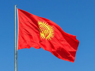 The flag of Kyrgyzstan flies