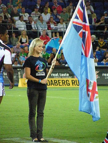 A flag bearer holds the Fijian flag at the 2008 Rugby League World Cup in Australia