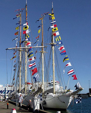 Maritime signal code flags attached to a yacht
