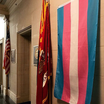 A Transgender Pride Flag hangs outside the front of Congressmember Ruben Gallego's office at the United States Capitol building in Washington DC, United States of America