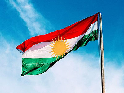 The flag of Kurdistan flies