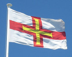 The flag of Guernsey flies