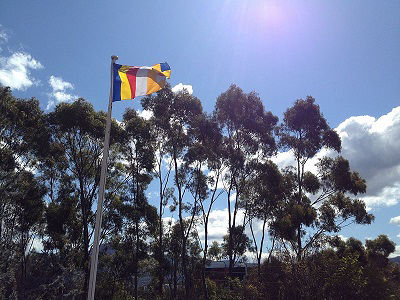 A Buddhist flag flying at the Nan Tien Temple in Wollongong, New South Wales, Australia