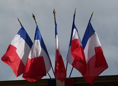 Numerous French flags on display