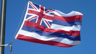 The flag of Hawaii flies at the Haleakala National Park in Hawaii, United States of America