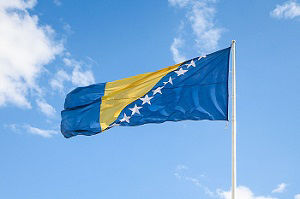 The flag of Bosnia And Herzegovina flies