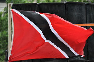 The flag of Trinidad and Tobago flies