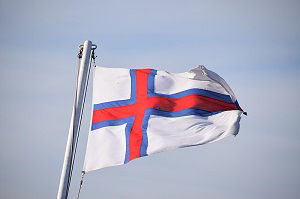 The flag of the Faroe Islands flies