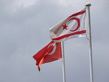 The flag of Northern Cyprus (right) flies alongside the flag of Turkey