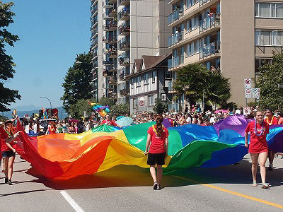 A giant rainbow flag is paraded at the Pride Parade in Vancouver, Canada in 2014