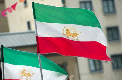 Two Iran Persia flags of 1964-1980 flying