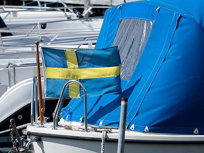 A Swedish flag being displayed on a boat